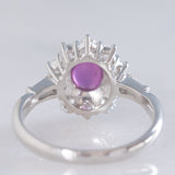 Anello a margherita vintage in platino con rubino stellato (1.35ct) e diamanti (0.66ctw ca.), anni ‘90