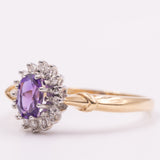Anello a margherita vintage in oro giallo 9K con ametista (0.40ct ca.) e diamanti (0.16ctw ca.), anni ‘80/‘90
