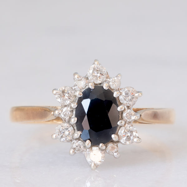 Anello a margherita vintage in oro giallo 9K con zaffiro (1ct ca.) e diamanti di taglio brillante (0.33ctw ca.), anno 1987
