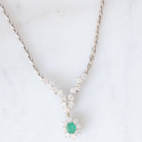 Collier vintage in oro bianco 18K con smeraldo (0.40ct ca.) e diamanti di taglio brillante (2.10ctw ca.), anni ‘80