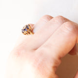 Vintage 14K yellow gold daisy ring with synthetic sapphires (approx. 0.60ctw) and brilliant cut diamond (approx. 0.10ct), 80s/90s