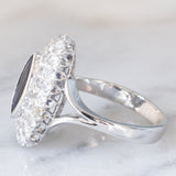 Anello a margherita navette in oro bianco 14K con zaffiro (1ct ca.) e diamanti (0.72ctw ca.), anni ‘70/‘80