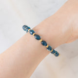 Braccialetto vintage in oro giallo 9K con pietre blu e pirite