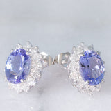 Orecchini a margherita vintage in platino con tanzaniti (4.45ctw) e diamanti (1.26ctw), anni ‘80/‘90