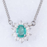 Collier vintage in platino con ciondolo a margherita con smeraldo (0.35ct) e diamanti (0.23ctw)