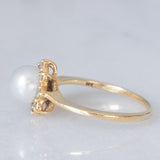 Anello a margherita vintage in oro giallo 14K con perla bianca e diamanti di taglio brillante (0.08ctw ca.), anni ‘60