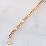 Braccialetto semirigido retrò in oro giallo 14K a argento con zaffiro (1ct ca.) e diamanti di taglio rosetta (0.36ctw ca.), anni ‘40/‘50