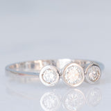 Vintage-Trilogie aus 14 Karat Weißgold mit Diamanten im Brillantschliff (ca. 0.26 Karat), 90er Jahre