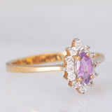 Anello a margherita in oro giallo 9K con zaffiro viola sintetico (0.25ct) e zirconi bianchi