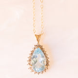 Vintage-Halskette mit Kette aus 9-karätigem Gelbgold und Anhänger aus 9-karätigem Gelb- und Weißgold mit blauem Topas (ca. 4.70 ct) und Diamanten