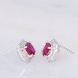 Orecchini a margherita vintage in platino con rubini (1.27ctw) e diamanti (0.50ctw), anni '80