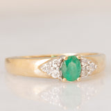Vintage 9K yellow gold band ring with emerald (0.25ct approx.) and diamonds (0.12ctw approx.)