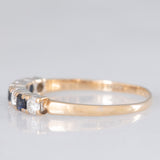 Bague vintage en or jaune 9 carats avec saphirs (environ 0.18 ct au total) et diamants taille brillant (environ 0.16 ct au total), année 1987