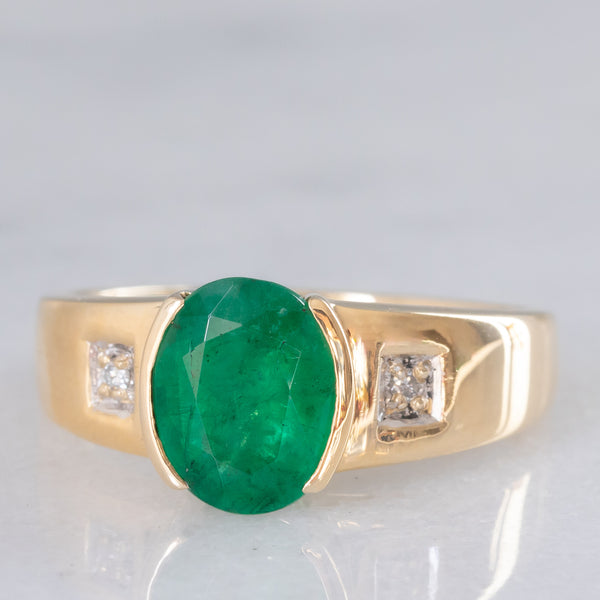 Anello a fascia vintage in oro giallo 9K con smeraldo (2.50ct ca.) e diamanti, anni ‘70/‘80