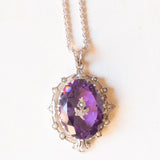 Necklace with 14K white gold chain and silver pendant with Chinese hibiscus insert and amethyst (approx. 14ct) and white beads