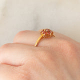 Anello a fiore in oro giallo 9K con zaffiri rossi (0.55ctw)