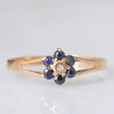 Anello a fiore vintage in oro giallo 9K con zaffiri (0.30ctw ca.) e diamante, anno 1977