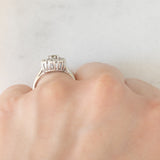 Anello a margherita vintage in oro bianco 14K con diamanti di taglio brillante (0.16ctw ca.) e con centrale fancy brown, anni ‘80
