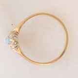 Anello a margherita vintage in oro giallo 9K con topazio azzurro (0.30ct ca.) e diamanti (0.06ctw ca.), anni ‘80