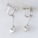 Orecchini pendenti a margherita vintage in platino con zaffiri (0.67ctw) e diamanti di taglio brillante (0.64ctw), anni ‘80/‘90