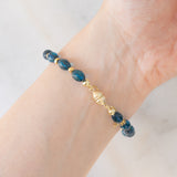 Braccialetto vintage in oro giallo 9K con pietre blu e pirite
