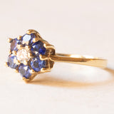 Vintage 14K yellow gold daisy ring with synthetic sapphires (approx. 0.60ctw) and brilliant cut diamond (approx. 0.10ct), 80s/90s