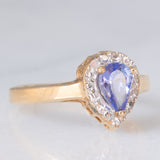 Anello a margherita vintage in oro giallo e bianco 9K con tanzanite (0.60ct ca.), anni ‘90