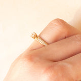 Anello a margherita vintage in oro giallo 14K con diamanti di taglio brillante (0.25ctw ca.), anni ‘70/‘80