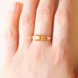 Vintage-Bandring aus 10-karätigem Gelbgold mit Citrinquarz (ca. 0.45 ct) und Diamanten im Brillantschliff (ca. 0.06 ctw), 70er Jahre