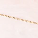 Collana vintage con catenina in oro giallo 9K e ciondolo in oro giallo 10K con tanzaniti (1.30ctw ca.) e diamanti