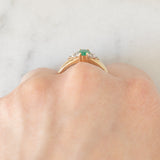 Vintage 9K yellow gold band ring with emerald (0.25ct approx.) and diamonds (0.12ctw approx.)