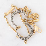 Vintage 18K yellow gold and silver semi-rigid bracelet with crescent-shaped decorations and rose-cut diamonds, 50s