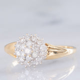 Anello a fiore vintage in oro giallo e bianco 14K con diamanti di taglio brillante (0.55ctw ca.), anni ‘80