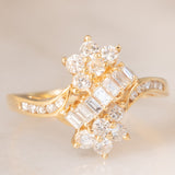 Anello vintage in oro giallo 14K con diamanti di taglio brillante e di taglio baguette (0.75ctw ca.), anni ‘70/‘80