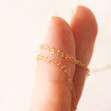 Vintage-Halskette mit drehbarem Anhänger aus 9-karätigem Gelbgold mit Quarz und Granat