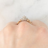 Anello a fiore vintage in oro giallo e bianco 9K con diamanti (0.15ctw ca.), anni ‘80