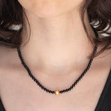 Collana moderna con onice e oro giallo 18K