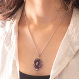 Necklace with 14K white gold chain and silver pendant with Chinese hibiscus insert and amethyst (approx. 14ct) and white beads