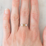 Trilogy vintage in platino con diamante centrale fancy brown (0.57ct) e diamanti laterali (0.20ctw)