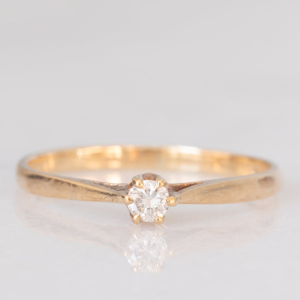 Solitario vintage in oro giallo 9K con diamante di taglio brillante (0.10ct ca.), anno 1982