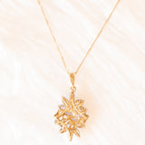 Vintage-Halskette mit Kette aus 9-karätigem Gelbgold und Anhänger aus 9-karätigem Gelbgold mit Tansaniten (ca. 0.48 ctw) und Diamanten, 80er/90er Jahre
