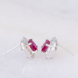 Orecchini a margherita vintage in platino con rubini (1.27ctw) e diamanti (0.50ctw), anni '80