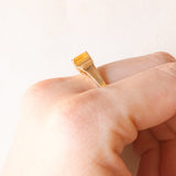 Vintage-Bandring aus 10-karätigem Gelbgold mit Citrinquarz (ca. 0.45 ct) und Diamanten im Brillantschliff (ca. 0.06 ctw), 70er Jahre