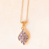 Vintage necklace with 9K yellow gold chain and 9K yellow gold pendant with tanzanites (approx. 1.35ctw), 70s/80s