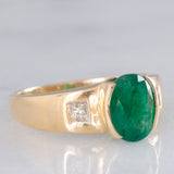 Anello a fascia vintage in oro giallo 9K con smeraldo (2.50ct ca.) e diamanti, anni ‘70/‘80