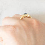 Anello a serpente vintage in oro giallo 14K con zaffiro e diamanti, anni ‘70