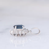 Ciondolo a margherita vintage in platino con zaffiro (0.64ct) e diamanti (0.23ctw)
