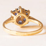 Vintage 14K yellow gold daisy ring with synthetic sapphires (approx. 0.60ctw) and brilliant cut diamond (approx. 0.10ct), 80s/90s