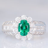 Anello a fiore vintage in platino con smeraldo (0.81ct) e diamanti (0.93ctw), anni ‘80