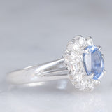 Anello a margherita vintage in platino con zaffiro (1.10ct) e diamanti (0.33ctw), anni ‘70